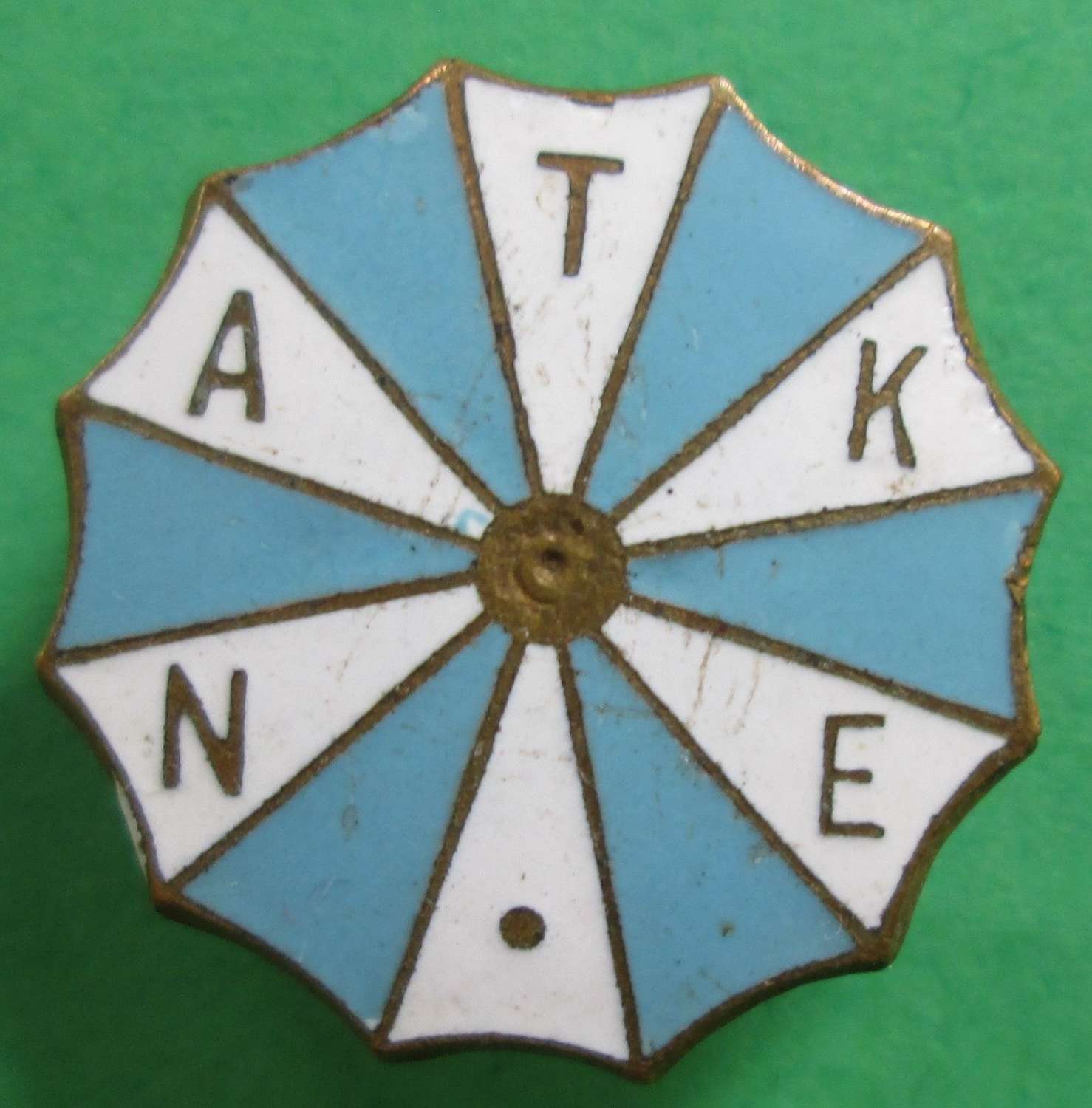 A NATIONAL ASSOCIATION OF THEATRICAL AND KINE EMPLOYEES BADGE