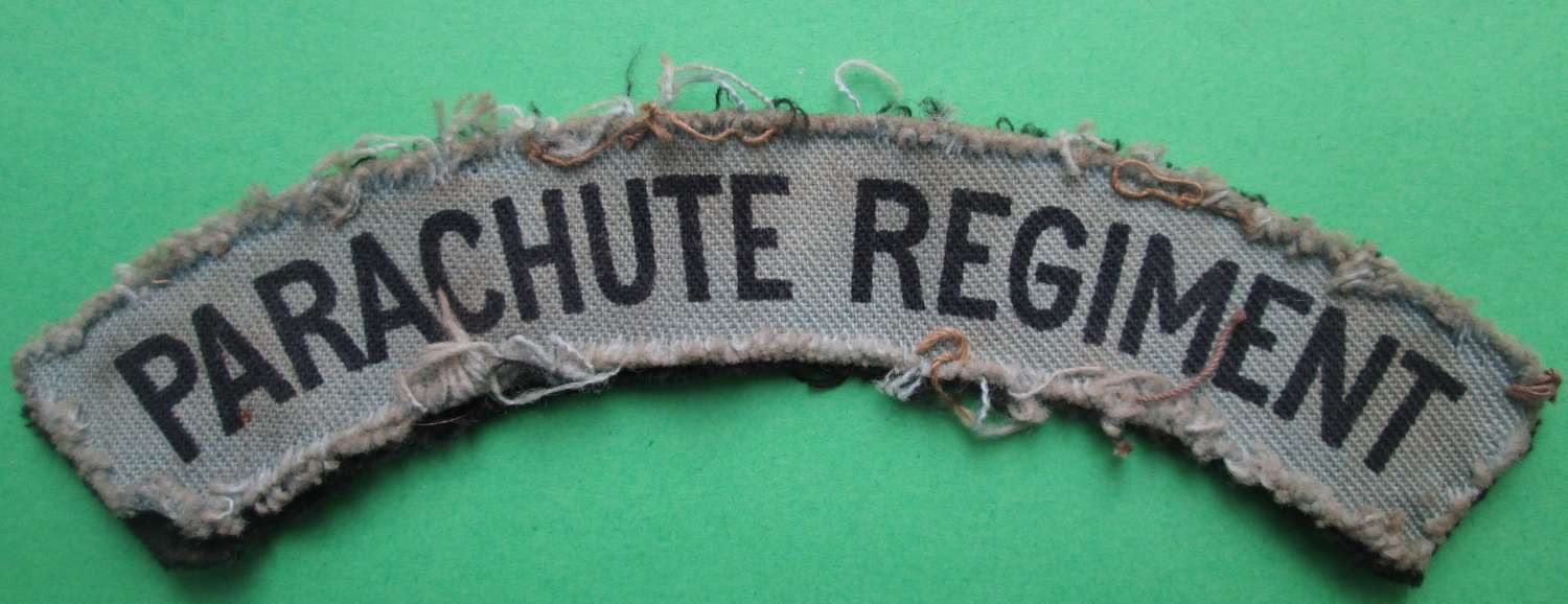 A WELL USED WWII PARACHUTE REGT SHOULDER TITLE PRINTED
