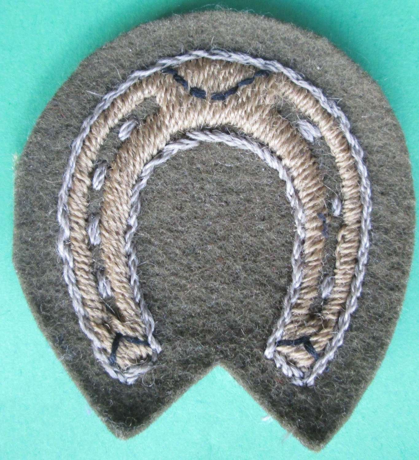 A GOOD EARLY WWII PERIOD FARRIER ARM BADGE HOUSEHOLD DIVISION EXAMPLE