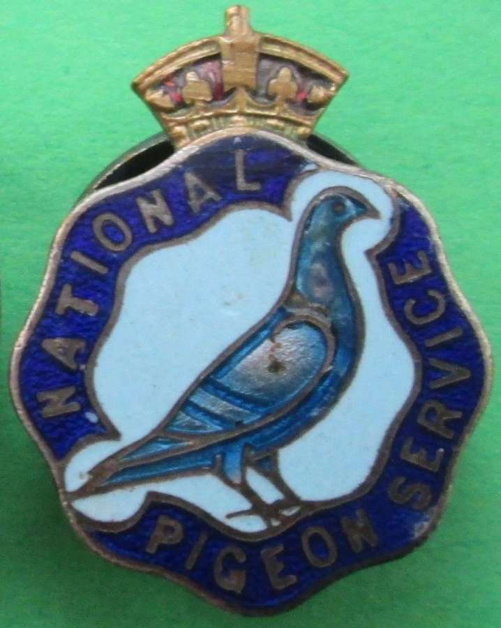 A GOOD EXAMPLE OF THE WWII NATIONAL PIGEON SERVICE LAPEL BADGE