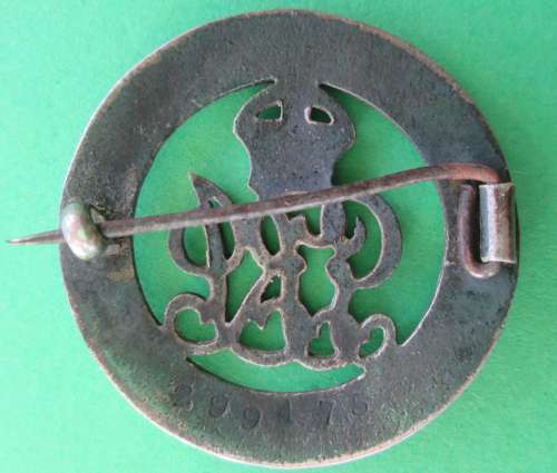 A silver WWI period wound badge