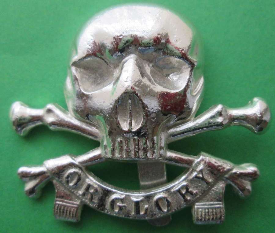 A 17th/21st Lancers cap badge