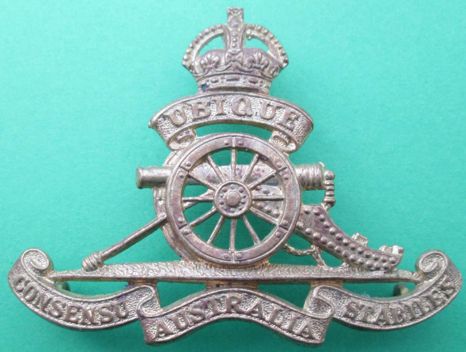 MISSING  -  A kings crown pre 1952 Royal Australian Artillery badge