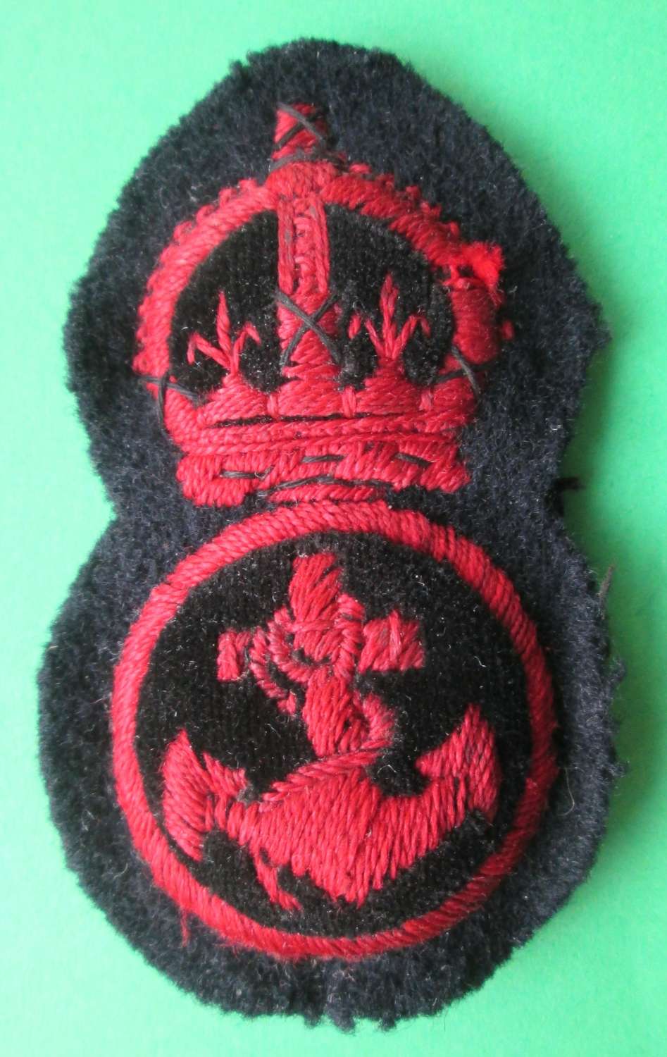 A Naval petty officer's cap badge