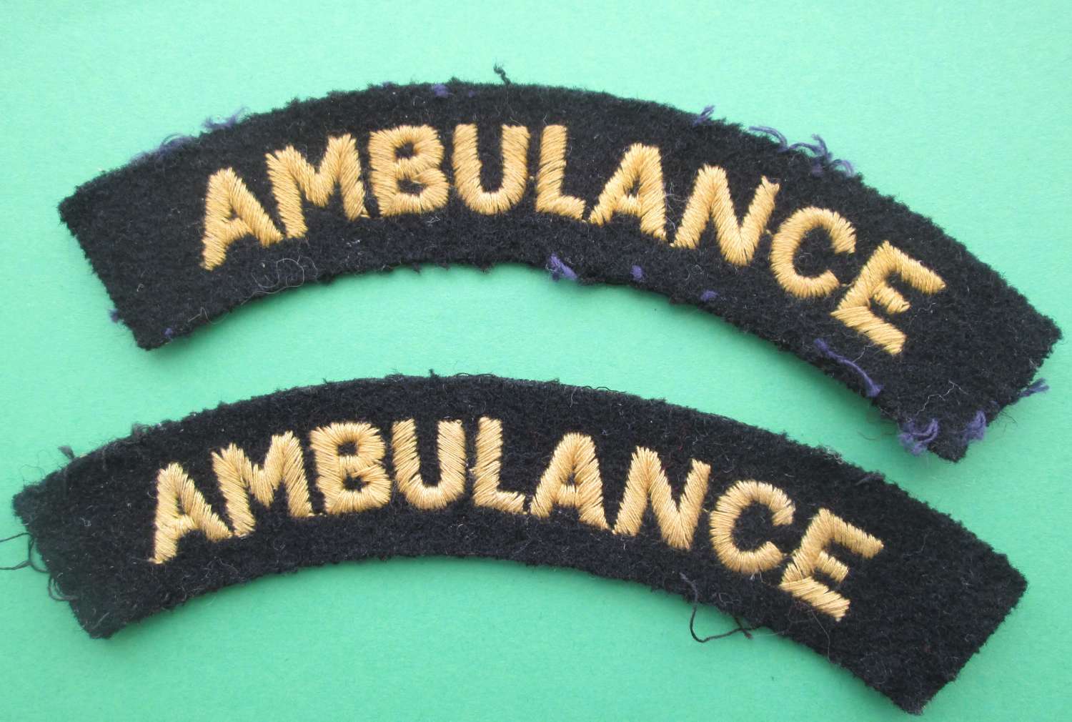 A PAIR OF CIVIL DEFENCE AMBULANCE TITLES