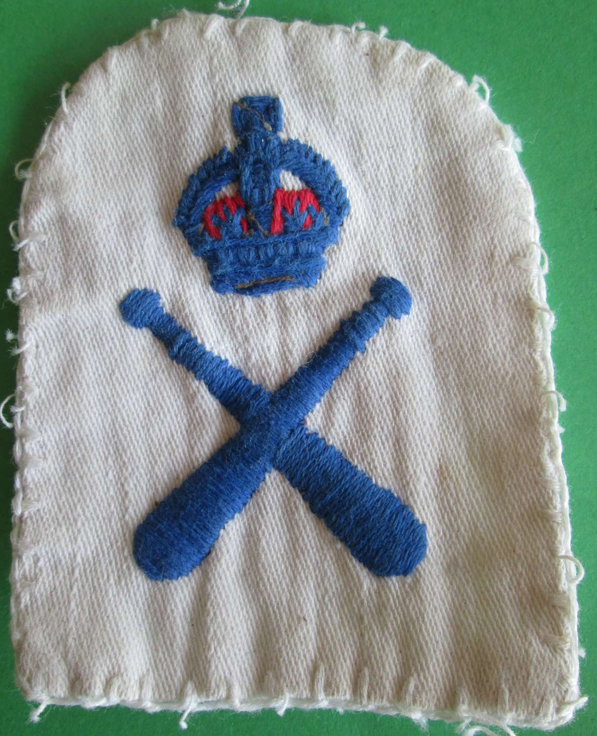 A WOVEN ROYAL NAVY PHYSICAL TRAINING INSTRUCTORS ARM BADGE