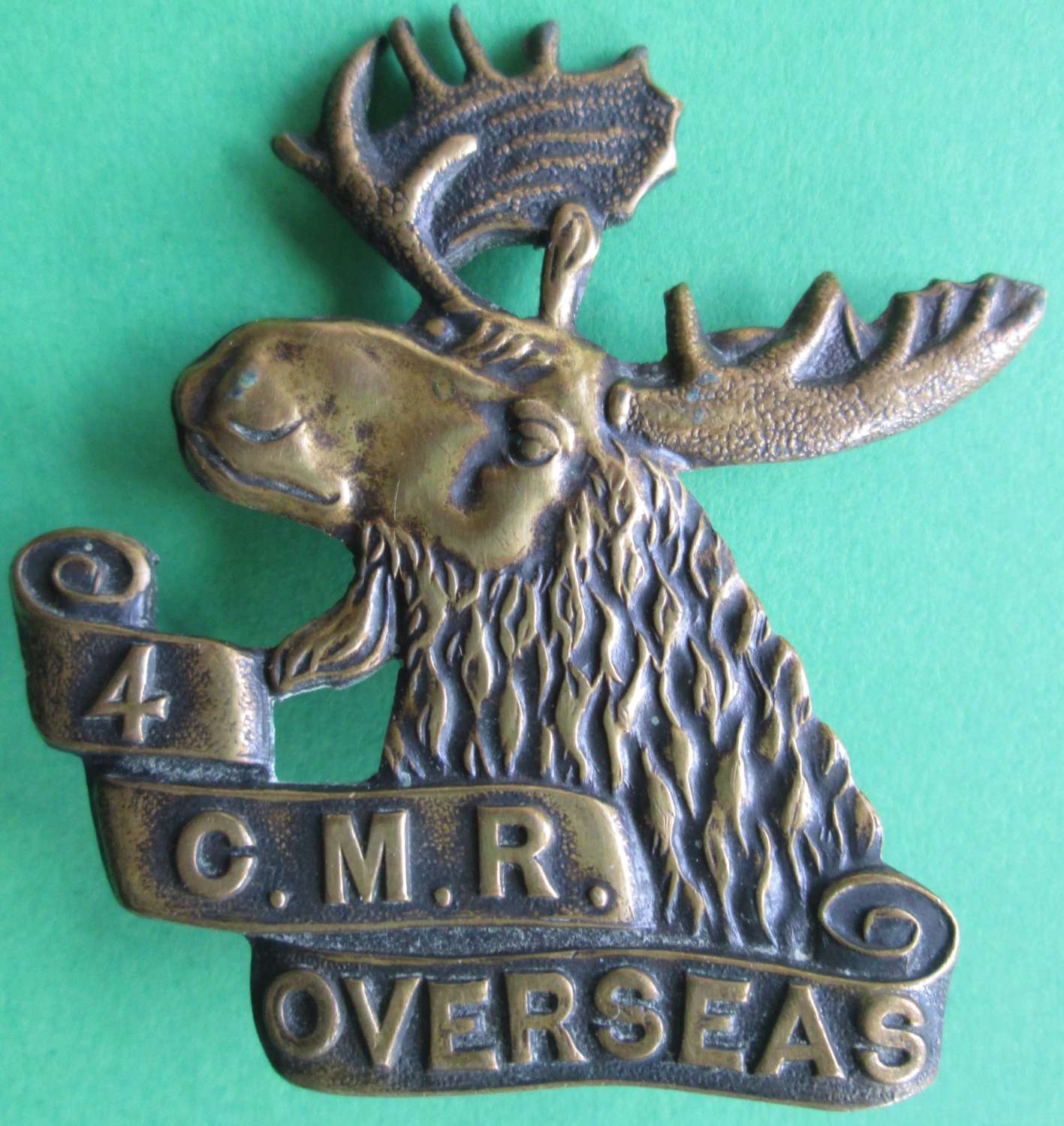 WWI PERIOD 4TH CANADIAN MOUNTED RIFLES BADGE