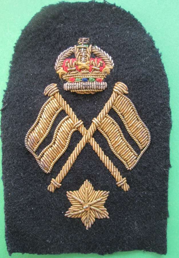 A ROYAL NAVY BULLION WIRE PETTY OFFICER'S SIGNALS ARM BADGE