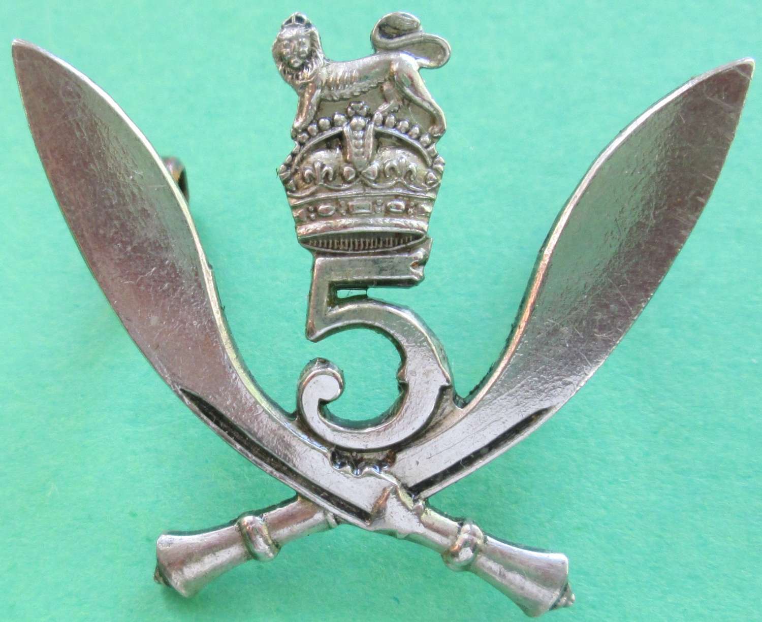 A pre 1952 5th Gurkha Rifles cap Badge