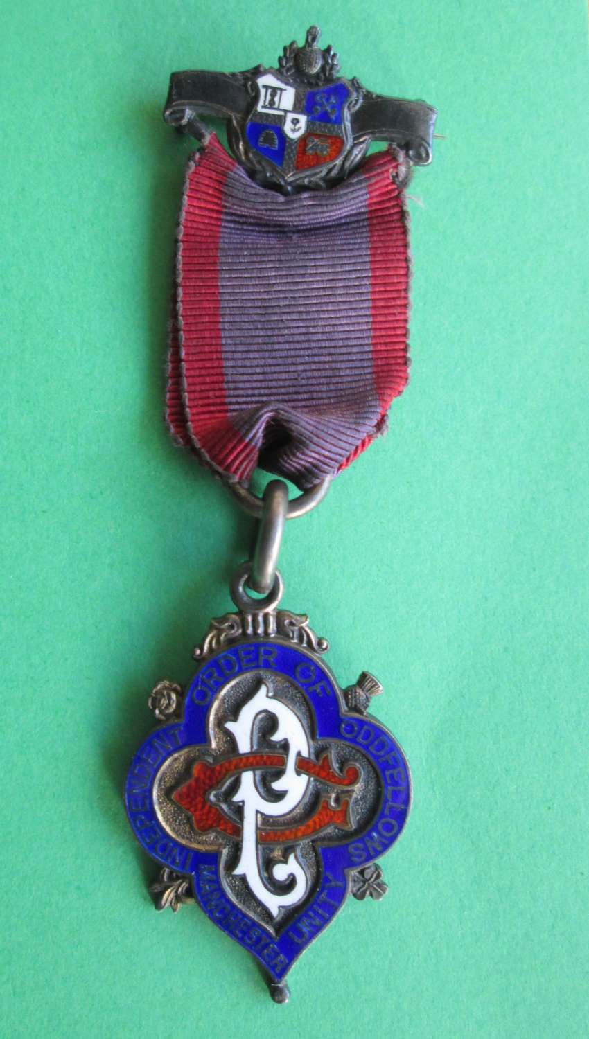A SILVER MANCHESTER UNITY INDEPENDENT ORDER OF ODDFELLOWS MEDAL