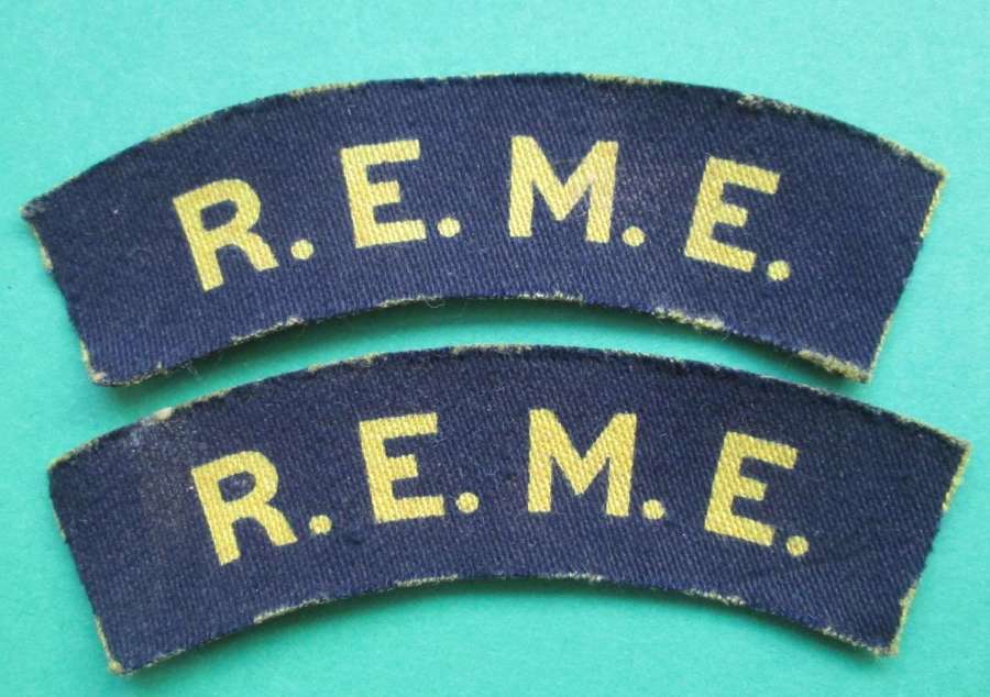 A PAIR OF R.E.M.E WWII PERIOD PRINTED SHOULDER TITLES
