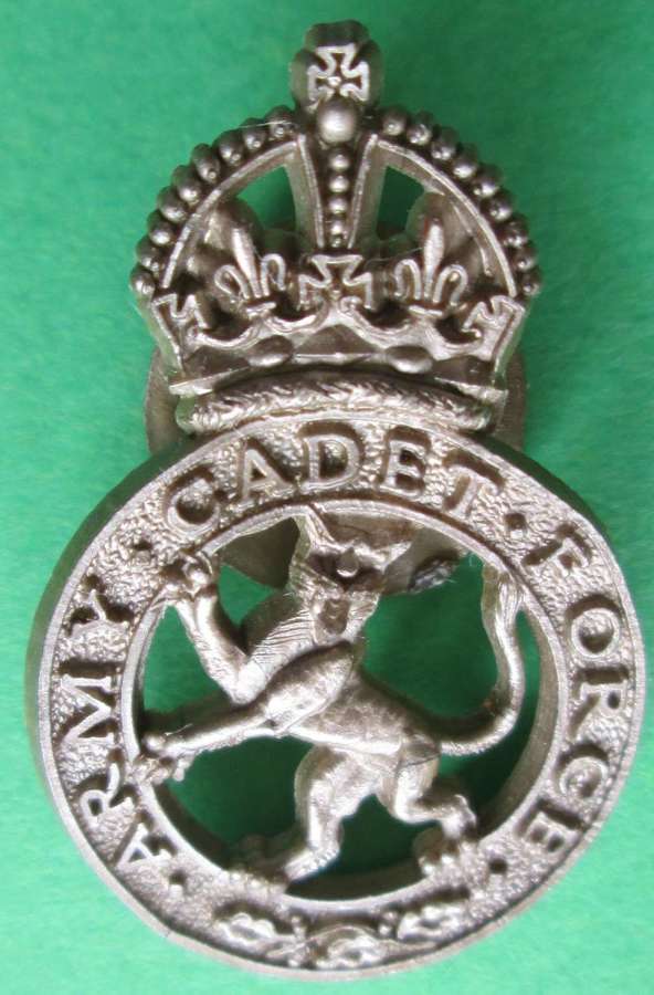 A WWII PLASTIC ARMY CADET FORCE BUTTON HOLE BADGE