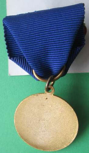A COLLECTION OF RED CROSS NURSING MEDALS AND BADGES