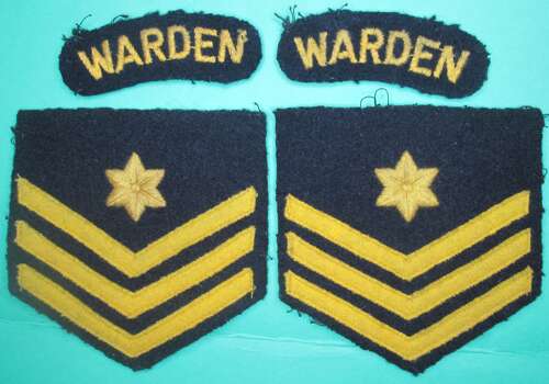 A SET OF CIVIL DEFENCE WARDEN'S INSIGNIA